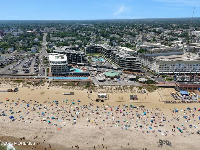 a view of a swimming pool with a lounge chairs