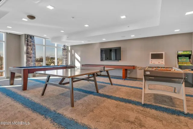 a room with lots of dining room and view of living room