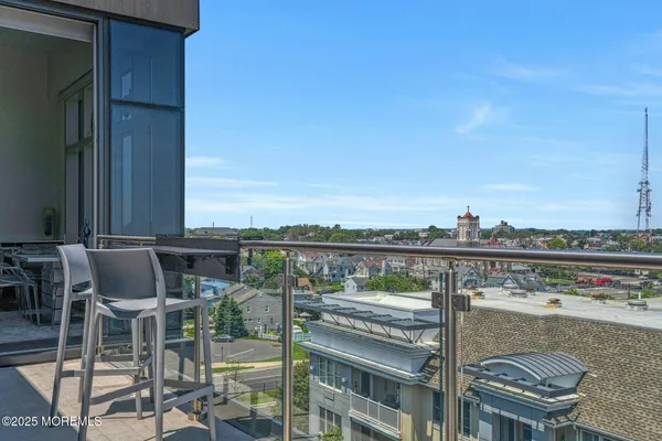 a view of city from terrace with seating space