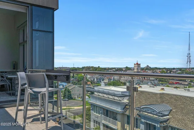 a view of city from terrace with seating space