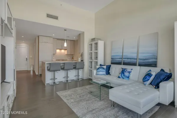 a living room with furniture and a table