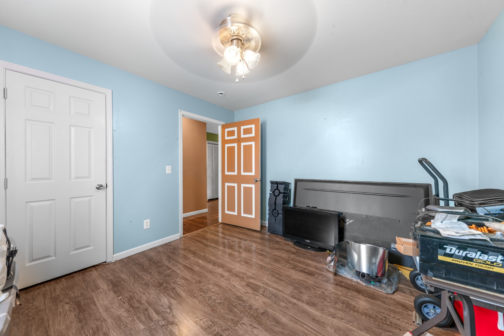 1916 Word Road Lewisburg, TN 37091 - Photo 11 of 69 a view of a livingroom with wooden floor and a ceiling fan