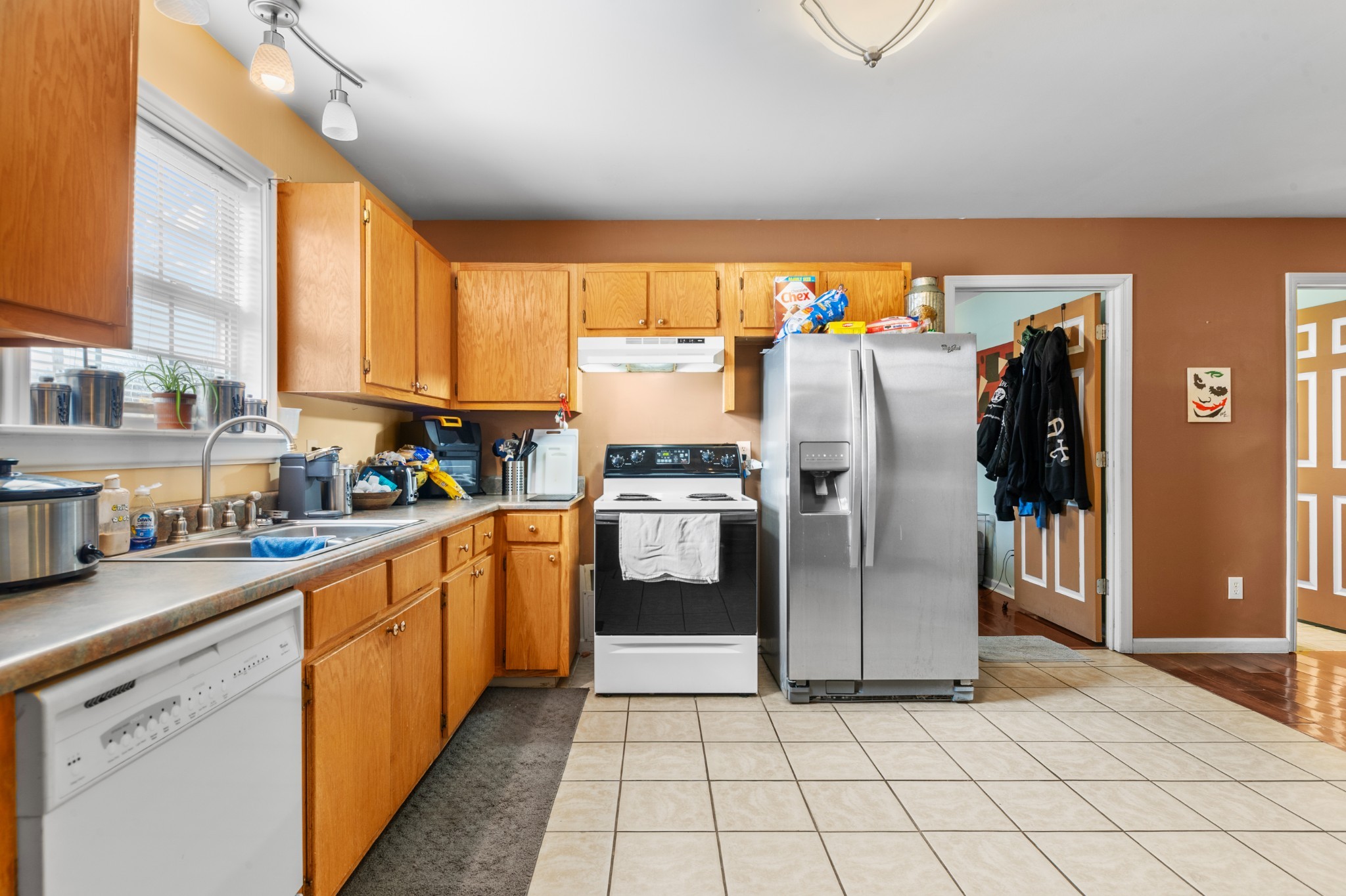 1916 Word Road Lewisburg, TN 37091 - Photo 17 of 69 a kitchen with stainless steel appliances granite countertop a refrigerator and a stove