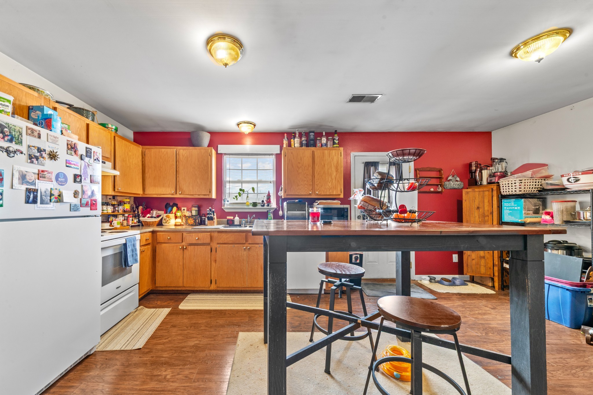 1916 Word Road Lewisburg, TN 37091 - Photo 24 of 69 a kitchen with stainless steel appliances granite countertop a sink and cabinets