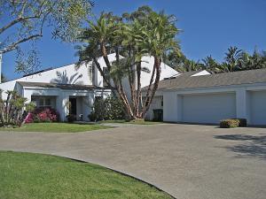 5320 Dorwin Lane Santa Barbara, CA 93111 - Photo 2 of 19 a front view of a house with a yard and garage