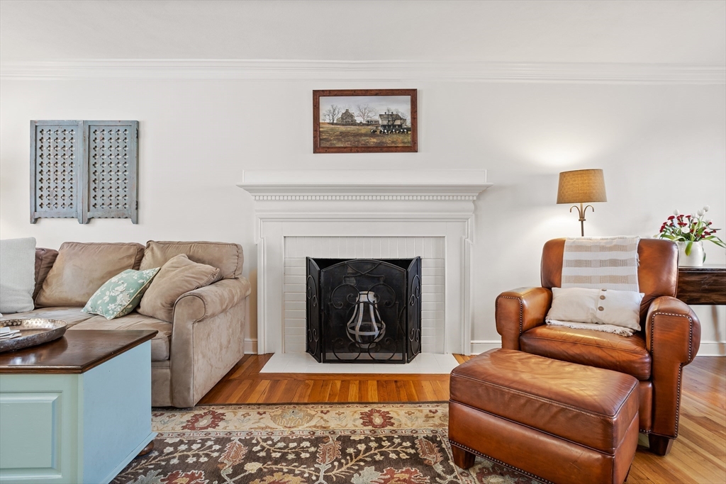 84 Vaughn Hill Road Bolton, MA 01740 - Photo 16 of 40 a living room with furniture and a fireplace