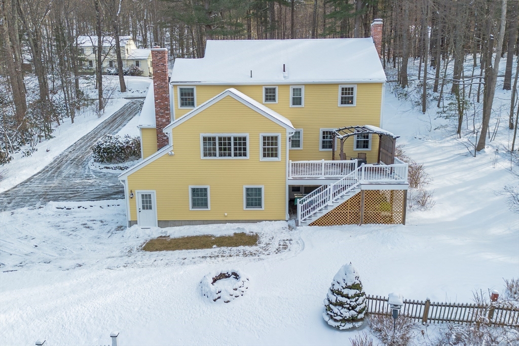 84 Vaughn Hill Road Bolton, MA 01740 - Photo 26 of 40 an aerial view of a house