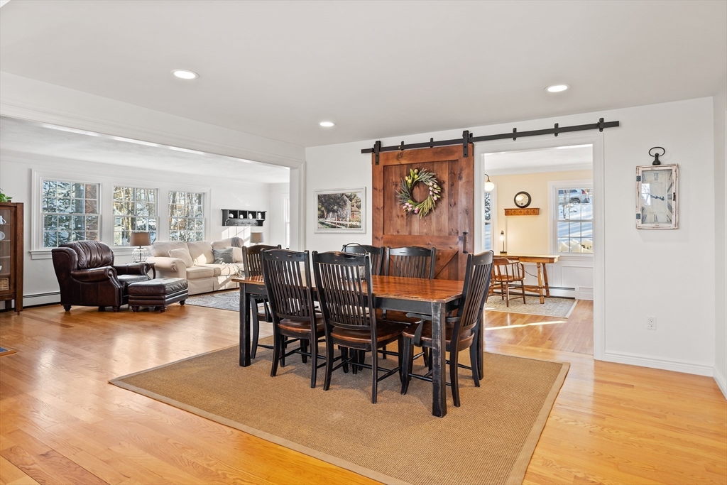 84 Vaughn Hill Road Bolton, MA 01740 - Photo 8 of 40 a view of a dining room with furniture and a livingroom