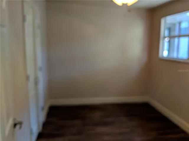 a kitchen with stainless steel appliances a refrigerator and a stove
