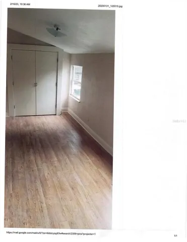 a view of gallery with wooden floor