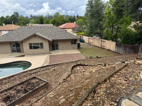 a view of a backyard with a trees