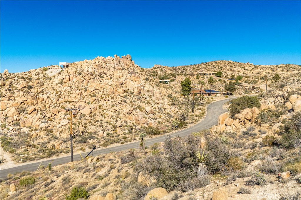 0 San Juan Road Yucca Valley, CA 92284 - Photo 12 of 24 a view of a large window with a view of mountains