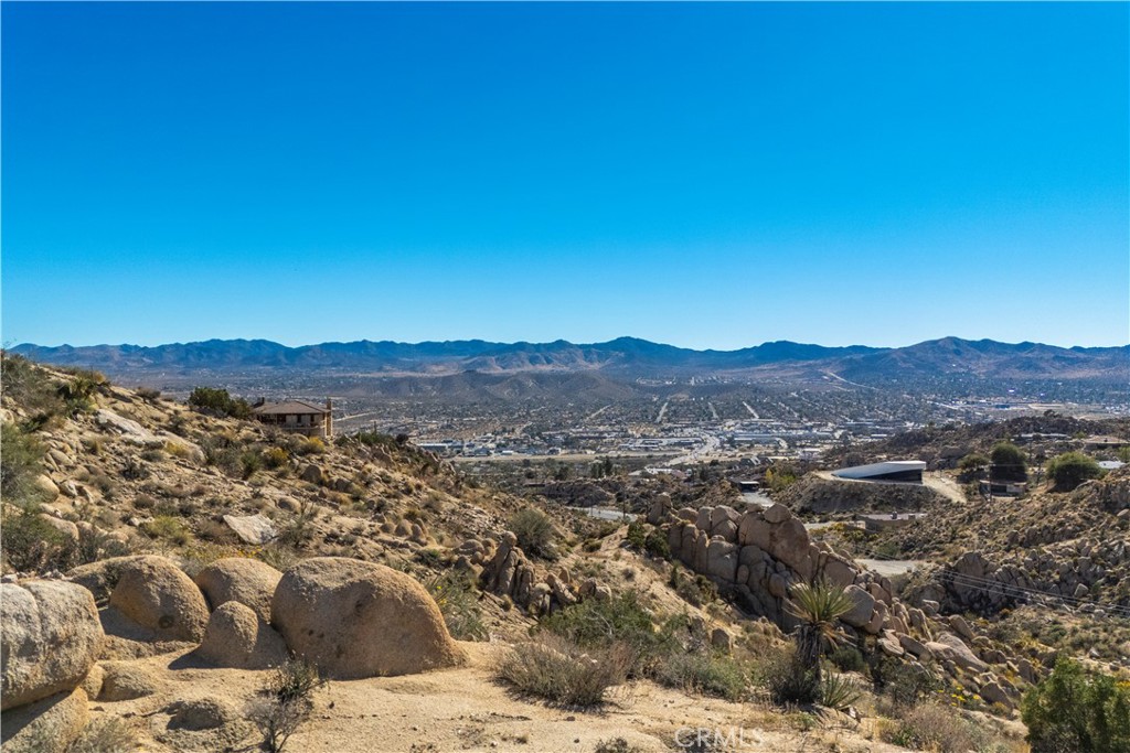 0 San Juan Road Yucca Valley, CA 92284 - Photo 21 of 24 a view of a city with mountain