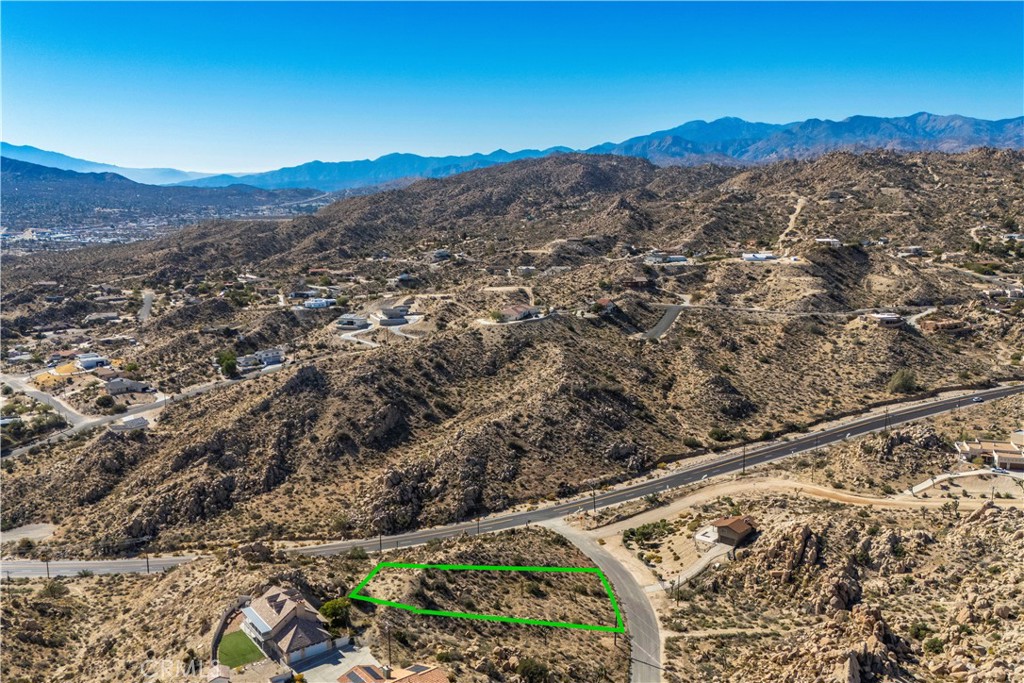 0 San Juan Road Yucca Valley, CA 92284 - Photo 24 of 24 a view of a yard with a mountain