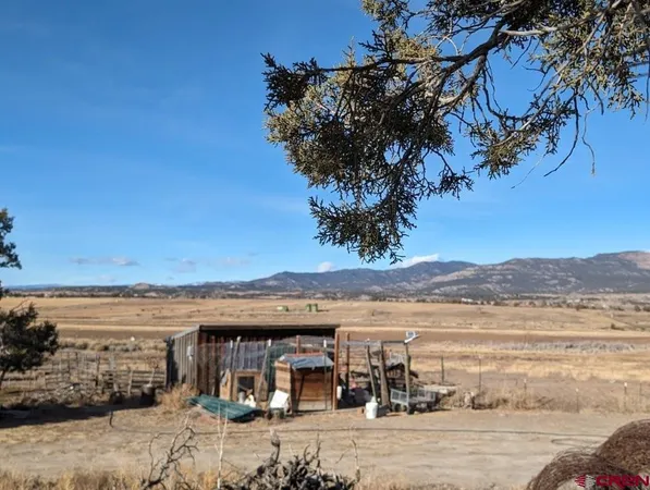 a view of a house with a ocean view