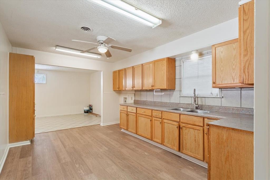 2424 South 26th Street Waco, TX 76706 - Photo 11 of 25 a view of a kitchen and a sink