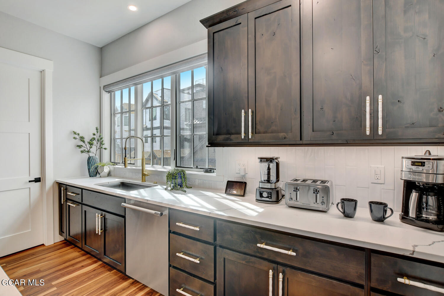 Undisclosed Address Winter Park, CO 80482 - Photo 12 of 52 a kitchen with stainless steel appliances granite countertop a sink a stove and cabinets