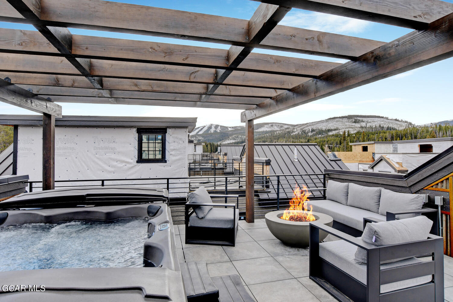 Undisclosed Address Winter Park, CO 80482 - Photo 33 of 52 a roof deck with couch and chairs