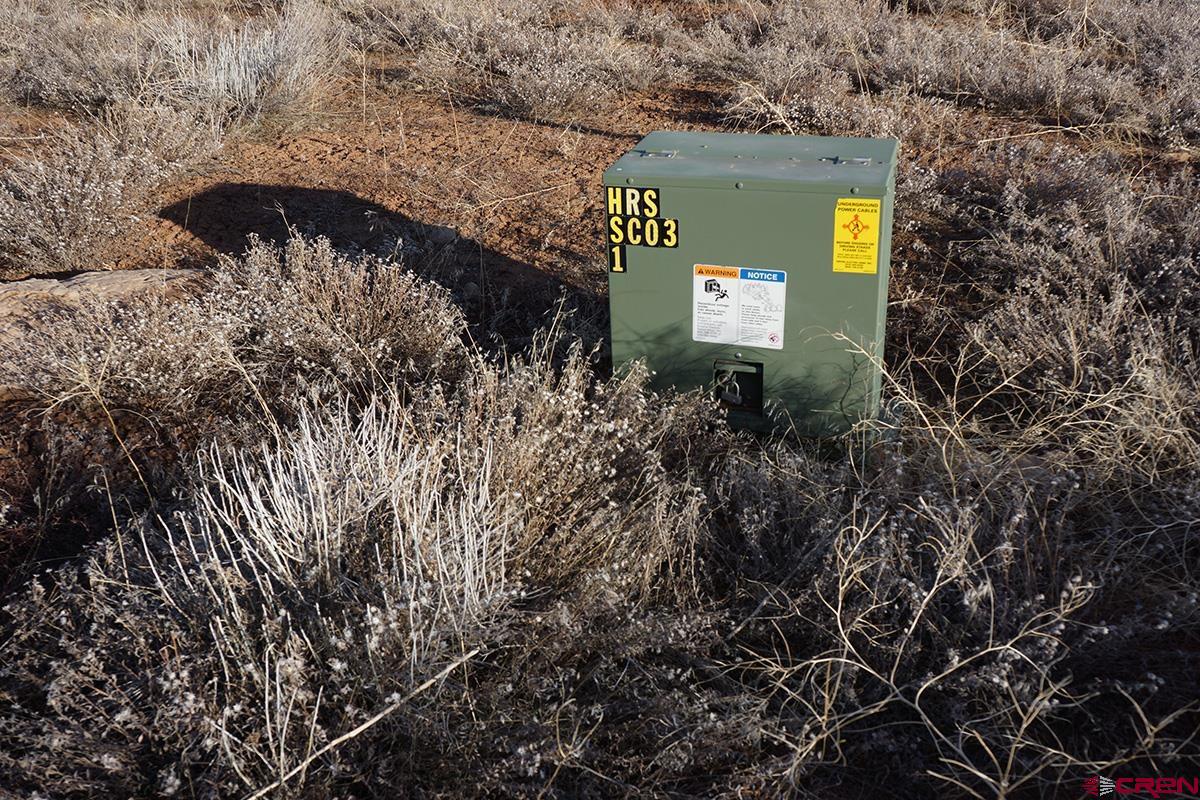19305 Road 26.2 Loop Dolores, CO 81323 - Photo 23 of 23 a view of a street with a building in the background