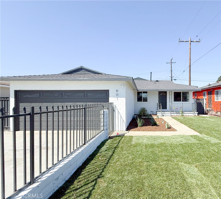 601 South Keene Avenue Compton, CA 90220 - Photo 1 of 1 a view of a house with backyard and porch