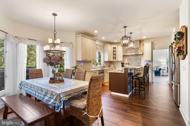 a view of hallway with wooden floor