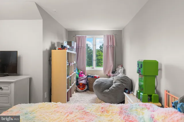 an aerial view of a house having swimming pool