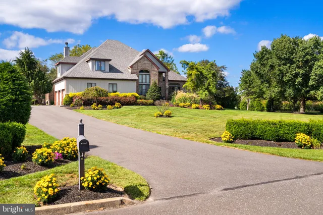 a view of a house with a big yard