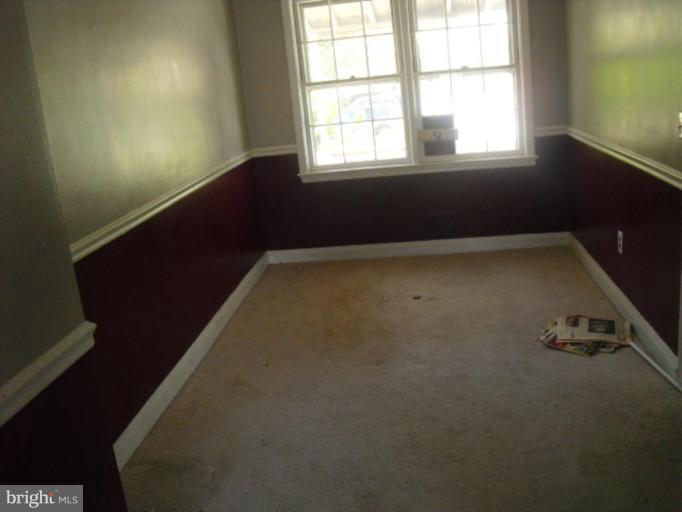 2232 Hawthorne Road Middle River, MD 21220 - Photo 3 of 6 an empty room with a window