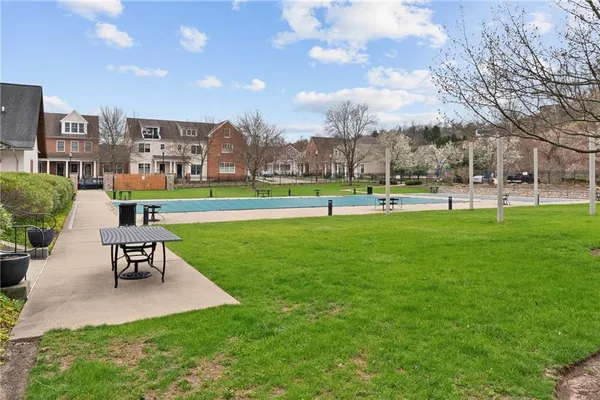a view of a building and a yard