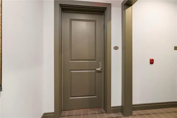 a bathroom with a glass door