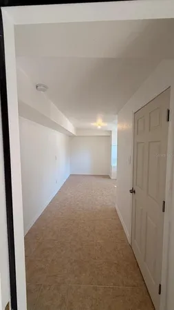 a view of a livingroom with furniture and storage
