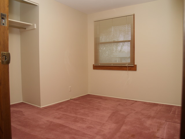 457 Rockhurst Road Bolingbrook, IL 60440 - Photo 14 of 24 a view of an empty room with a window