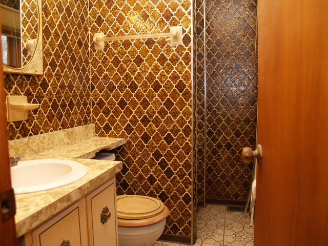457 Rockhurst Road Bolingbrook, IL 60440 - Photo 17 of 24 a bathroom with a granite countertop toilet and a sink