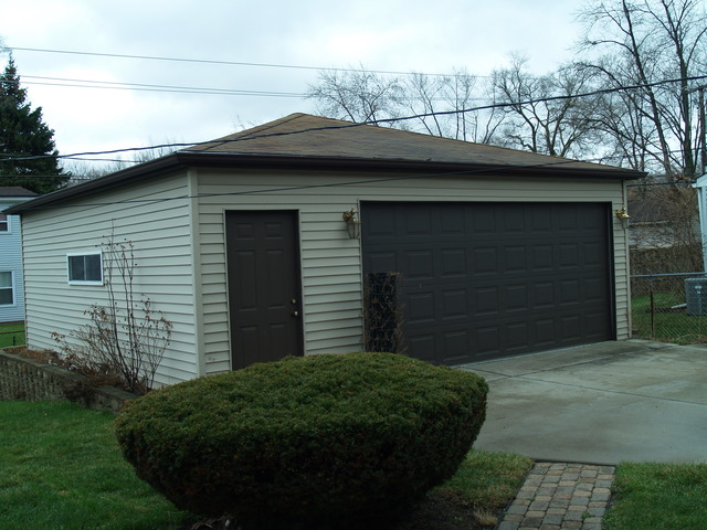 457 Rockhurst Road Bolingbrook, IL 60440 - Photo 22 of 24 a front view of a house with a yard