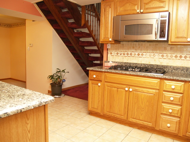 457 Rockhurst Road Bolingbrook, IL 60440 - Photo 3 of 24 a view of a kitchen