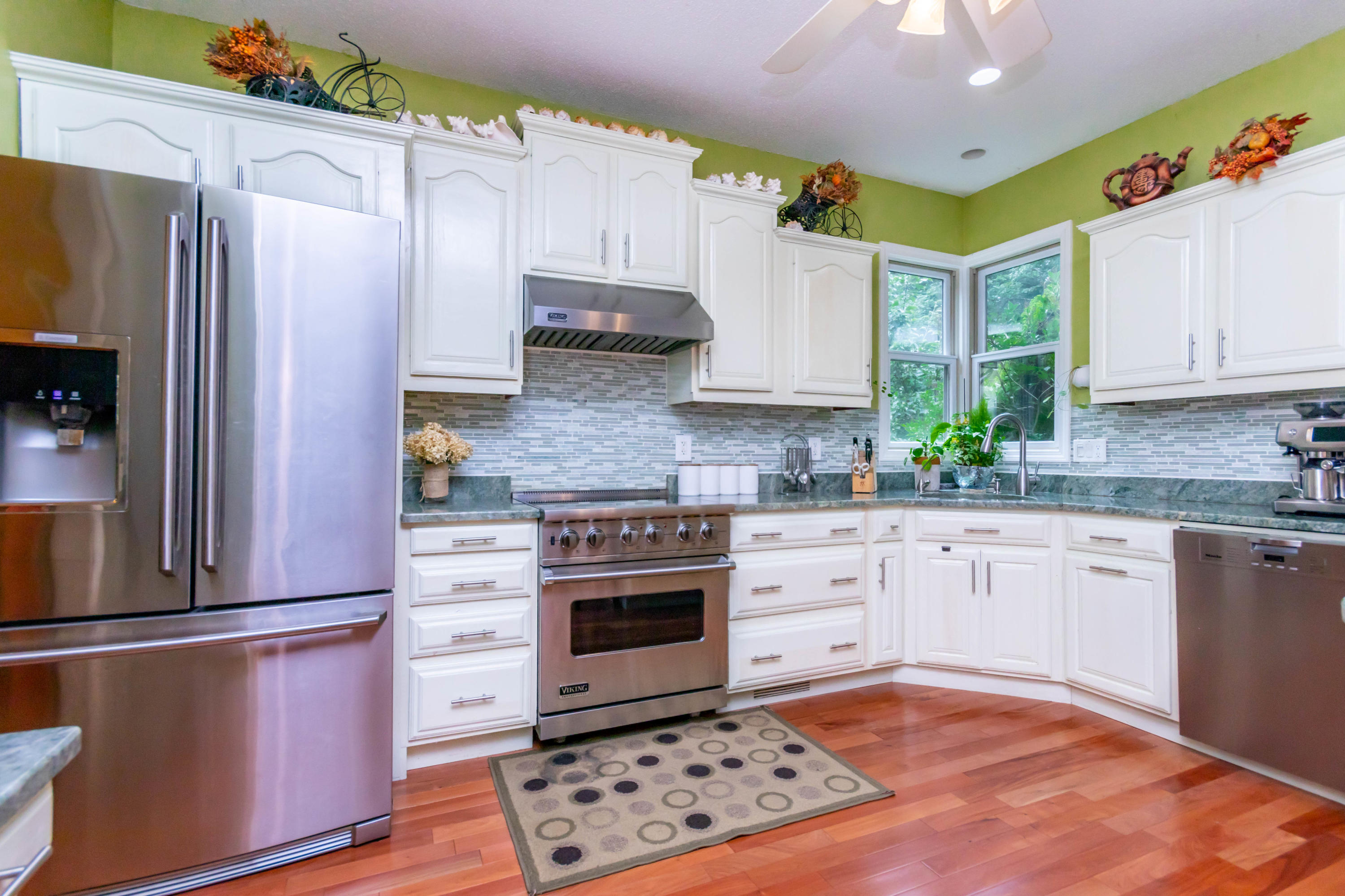 131 Bullivant Farm Road Marion, MA 02738 - Photo 9 of 36 White kitchen with granite & stainless