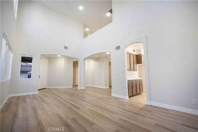 a view of a livingroom with wooden floor