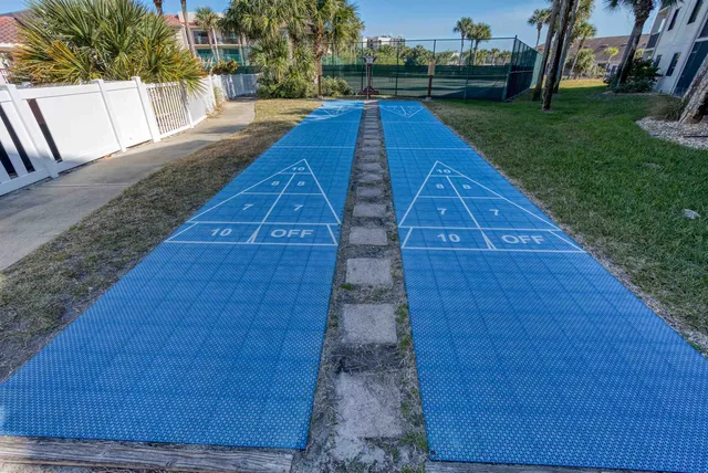 a view of a house with a street