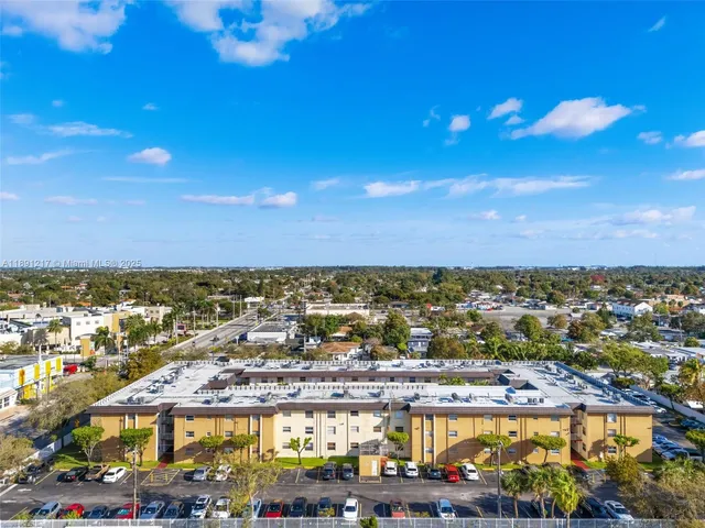 an aerial view of a city with lots of residential buildings
