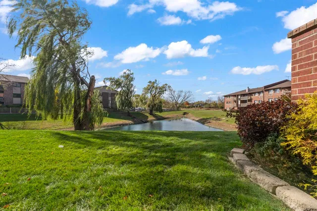 an aerial view of a house with a garden