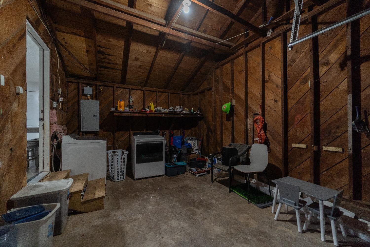 1517 41st Street Lubbock, TX 79412 - Photo 21 of 22 a view of room with wooden floor and furniture