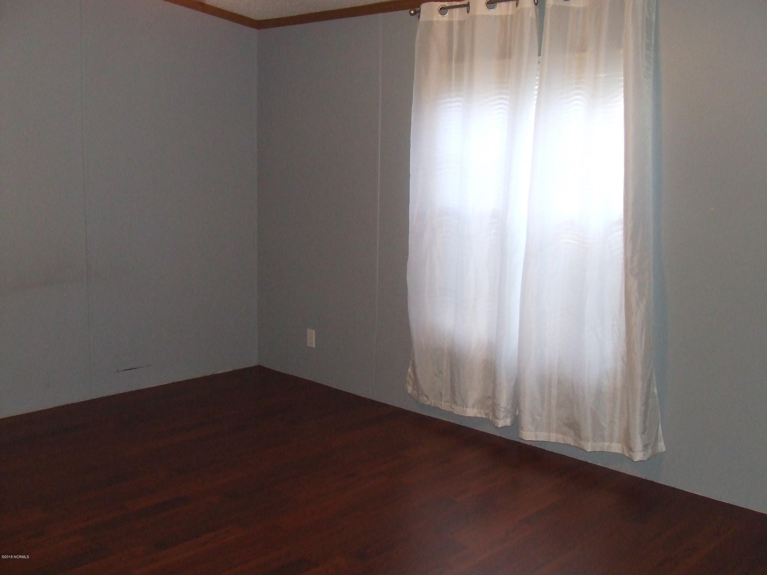 4714 Port Loop Road Southeast Southport, NC 28461 - Photo 25 of 39 MASTER BEDROOM
