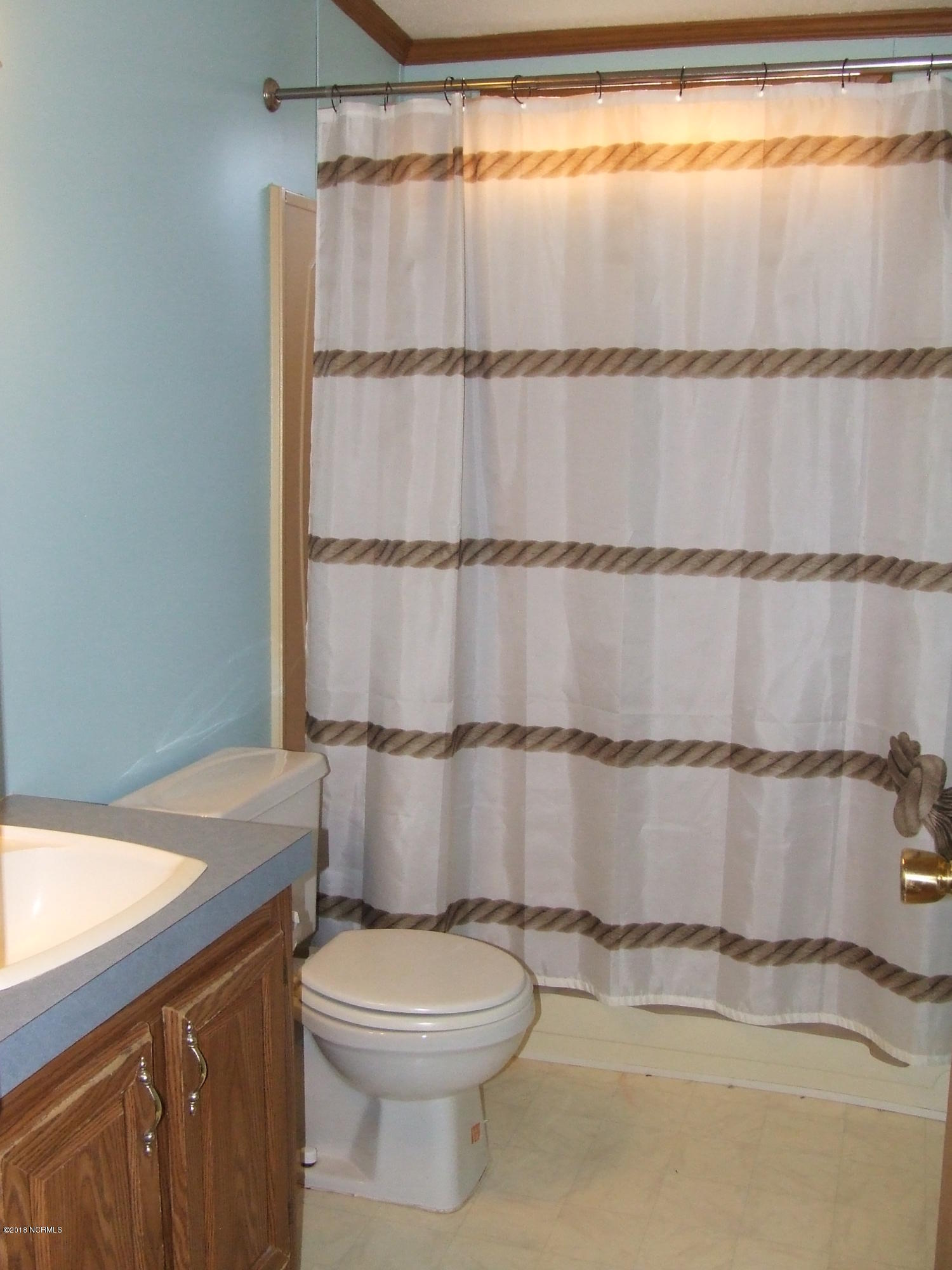 4714 Port Loop Road Southeast Southport, NC 28461 - Photo 35 of 39 GUEST BATHROOM