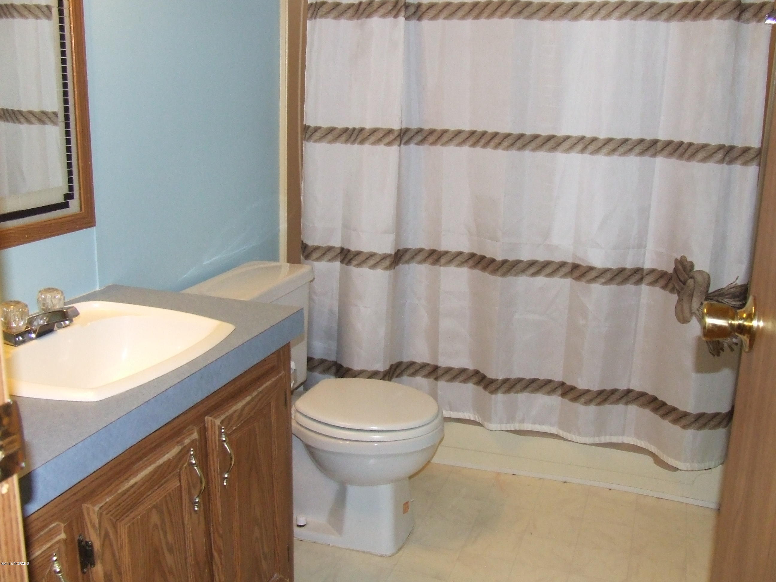 4714 Port Loop Road Southeast Southport, NC 28461 - Photo 36 of 39 GUEST BATH
