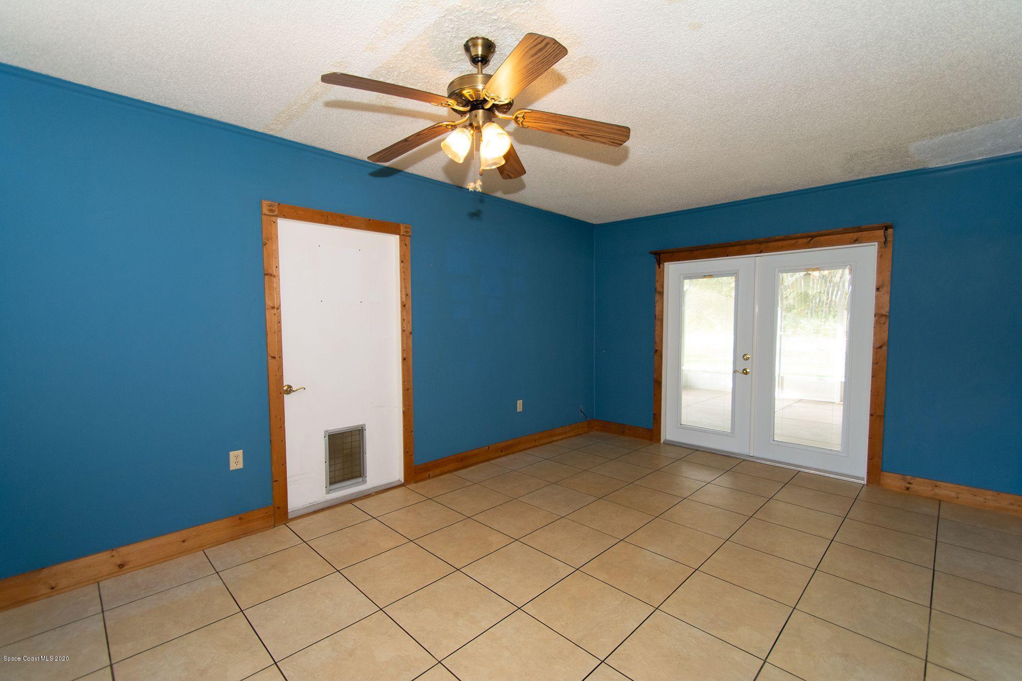 2872 Pembroke Road Melbourne, FL 32935 - Photo 14 of 32 a view of an empty room and window