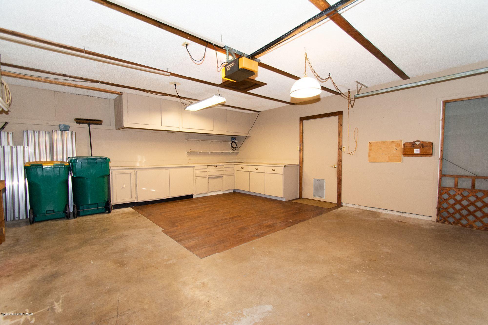 2872 Pembroke Road Melbourne, FL 32935 - Photo 20 of 32 a view of a garage with furniture