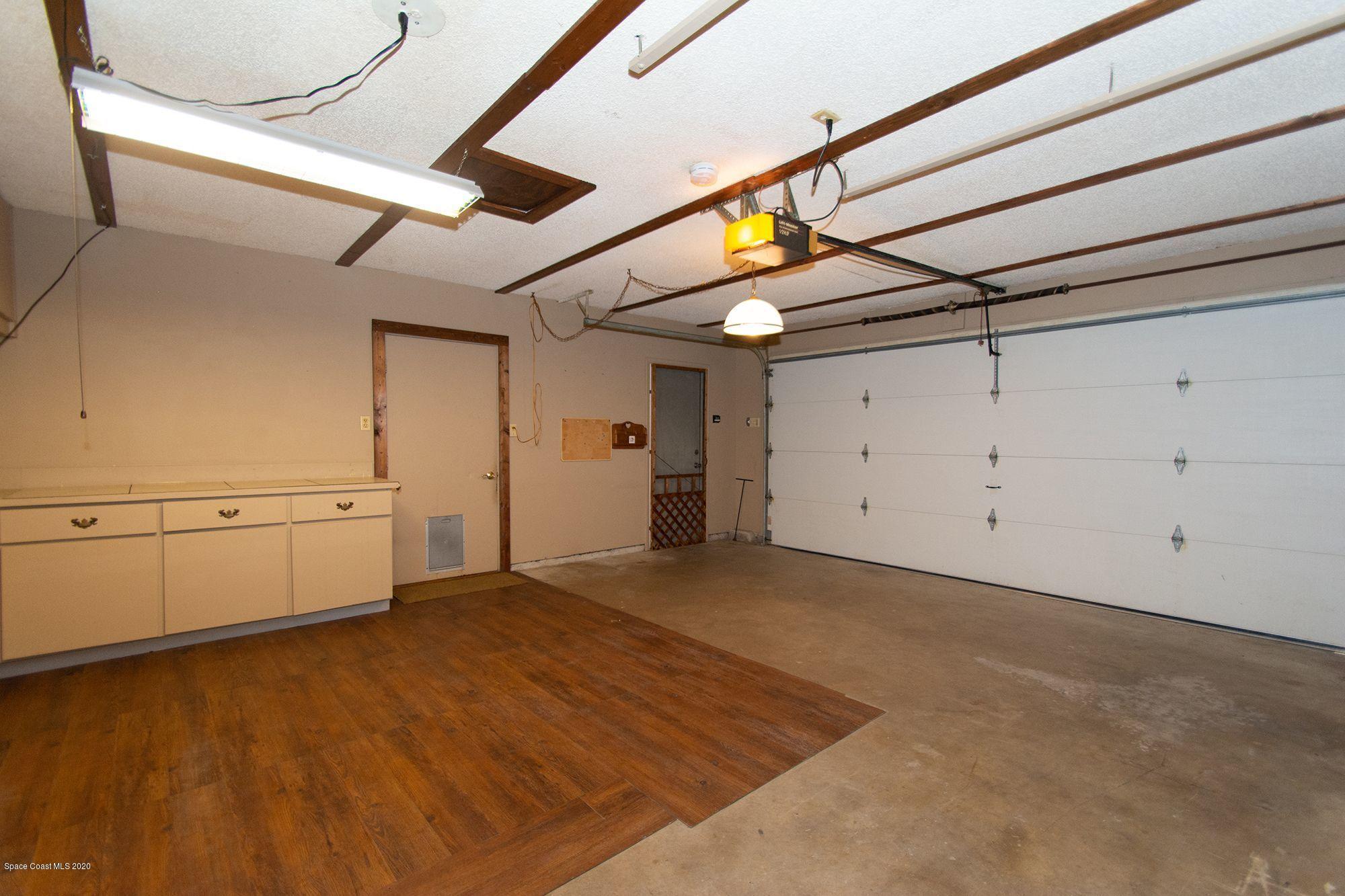 2872 Pembroke Road Melbourne, FL 32935 - Photo 21 of 32 a view of a garage