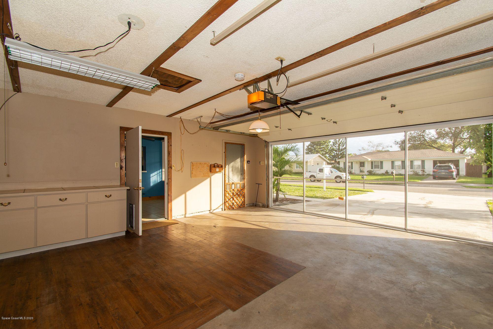 2872 Pembroke Road Melbourne, FL 32935 - Photo 22 of 32 a view of an empty room with window