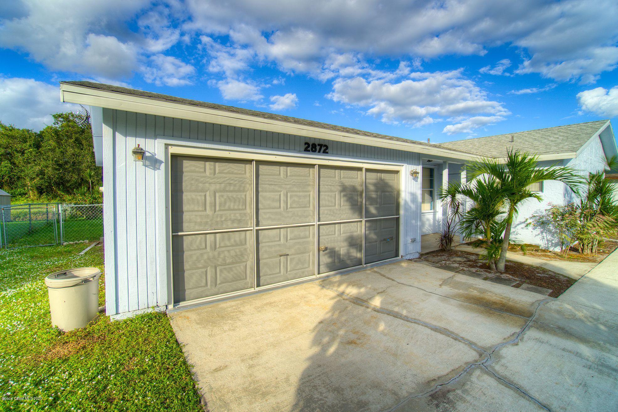 2872 Pembroke Road Melbourne, FL 32935 - Photo 4 of 32 a view of a backyard