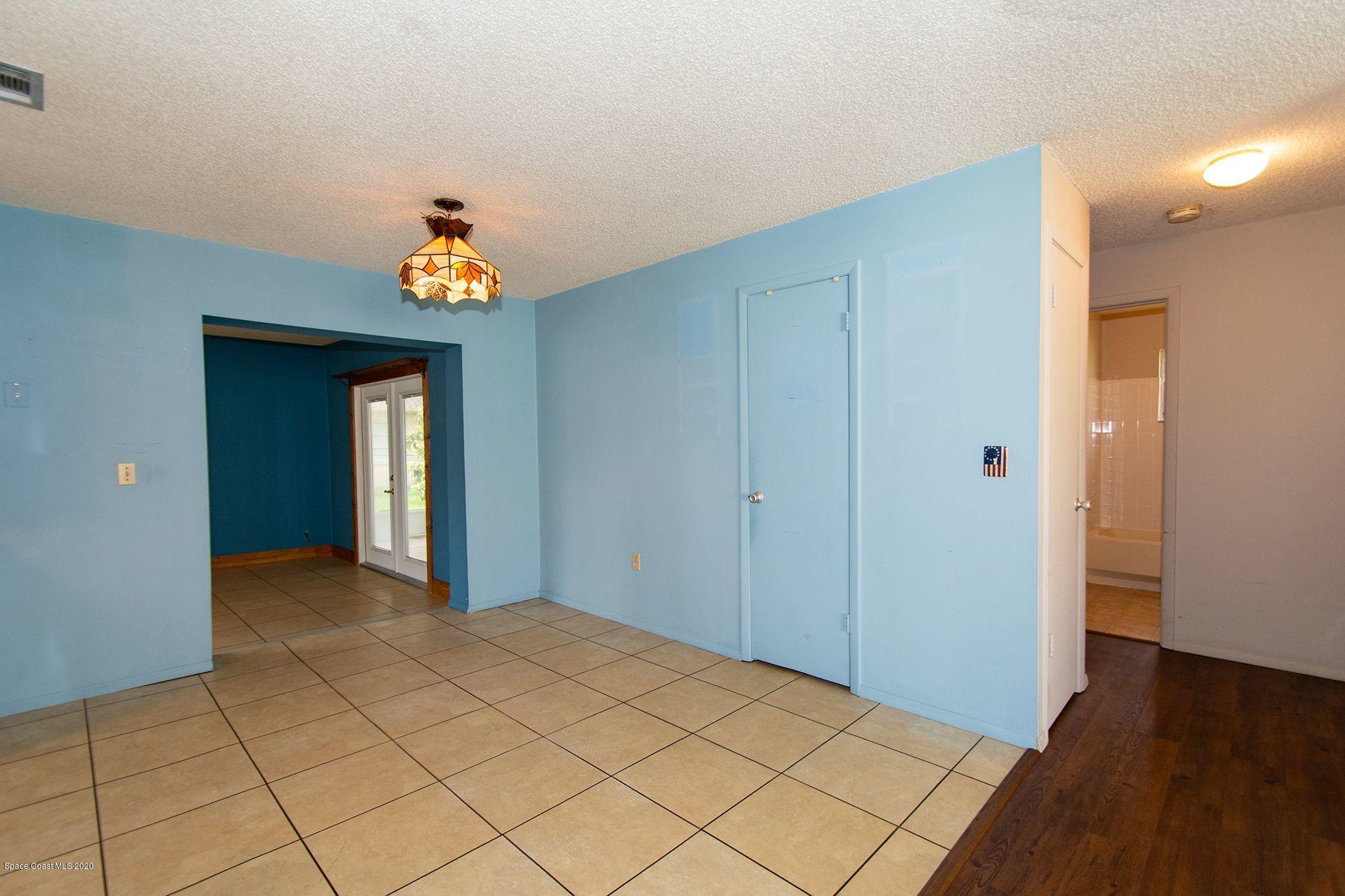 2872 Pembroke Road Melbourne, FL 32935 - Photo 9 of 32 a view of hallway with wooden floor